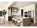 304 Edith Place Nw, Calgary, AB  - Indoor Photo Showing Kitchen With Stainless Steel Kitchen With Upgraded Kitchen 