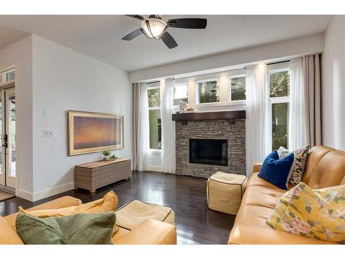 192 Cranarch Circle Se, Calgary, AB - Indoor Photo Showing Living Room With Fireplace
