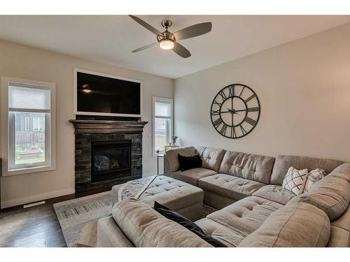 19 Vincent Crescent, Olds, AB - Indoor Photo Showing Living Room With Fireplace