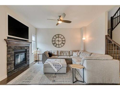 19 Vincent Crescent, Olds, AB - Indoor Photo Showing Living Room With Fireplace