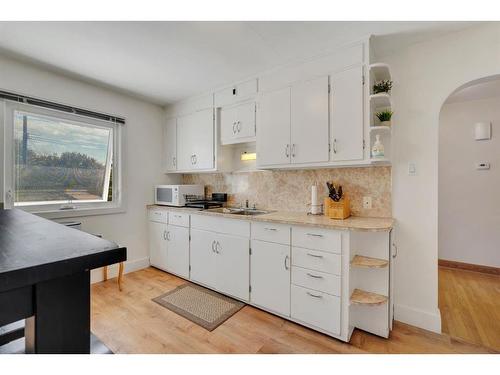 2452 22A Street Nw, Calgary, AB - Indoor Photo Showing Kitchen With Double Sink