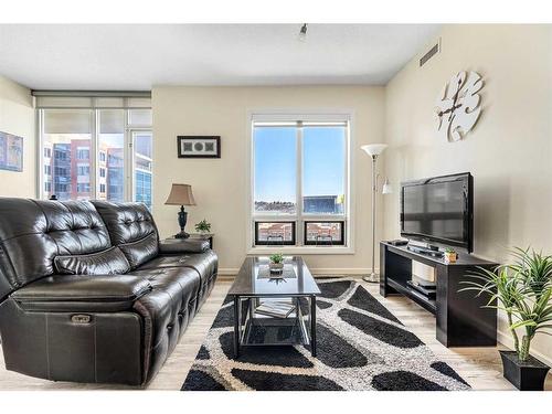 705-1410 1 Street Se, Calgary, AB - Indoor Photo Showing Living Room