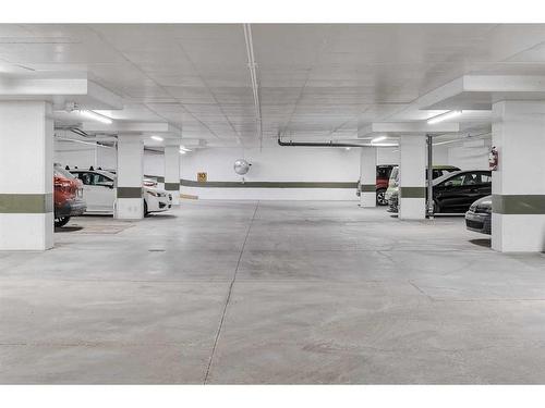 705-1410 1 Street Se, Calgary, AB - Indoor Photo Showing Garage