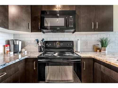 705-1410 1 Street Se, Calgary, AB - Indoor Photo Showing Kitchen