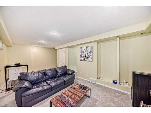 245 Killarney Glen Court Sw, Calgary, AB - Indoor Photo Showing Living Room