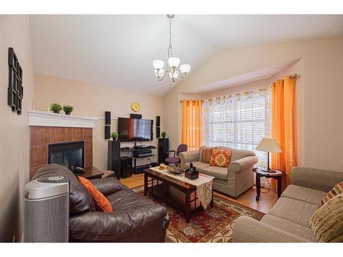 211 Taralake Way Ne, Calgary, AB - Indoor Photo Showing Living Room With Fireplace