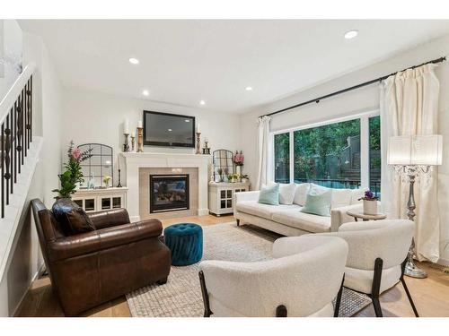 37 Ascot Crescent Sw, Calgary, AB - Indoor Photo Showing Living Room With Fireplace