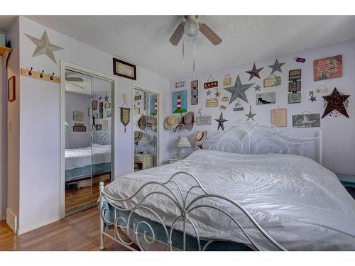 603 Anderson Crescent, Diamond Valley, AB - Indoor Photo Showing Bedroom