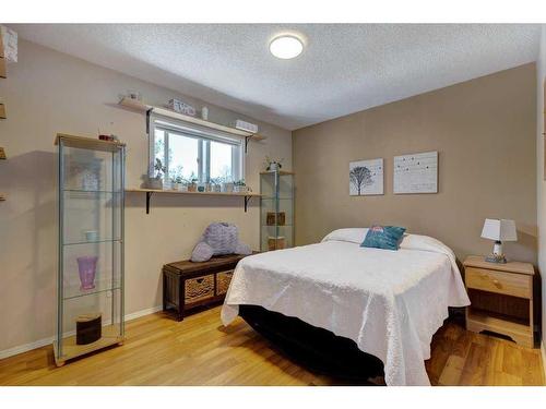 603 Anderson Crescent, Diamond Valley, AB - Indoor Photo Showing Bedroom