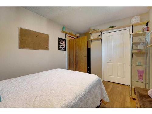 603 Anderson Crescent, Diamond Valley, AB - Indoor Photo Showing Bedroom