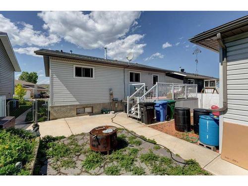 603 Anderson Crescent, Diamond Valley, AB - Outdoor With Deck Patio Veranda With Exterior