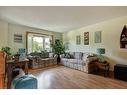 603 Anderson Crescent, Diamond Valley, AB  - Indoor Photo Showing Living Room 