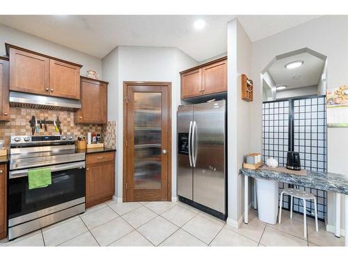 8 Aspen Hills Court Sw, Calgary, AB - Indoor Photo Showing Kitchen With Stainless Steel Kitchen