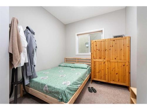 8 Aspen Hills Court Sw, Calgary, AB - Indoor Photo Showing Bedroom