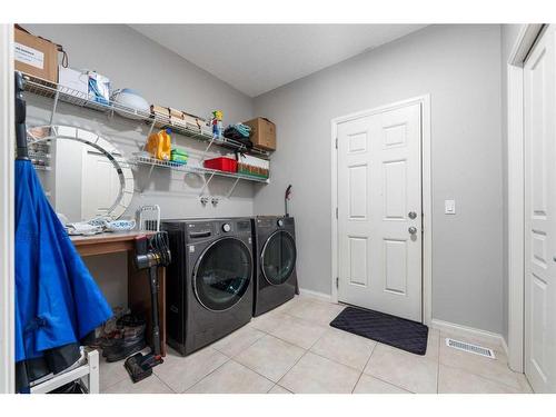 8 Aspen Hills Court Sw, Calgary, AB - Indoor Photo Showing Laundry Room