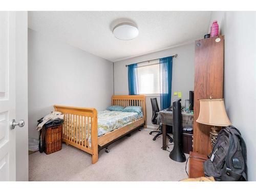 8 Aspen Hills Court Sw, Calgary, AB - Indoor Photo Showing Bedroom