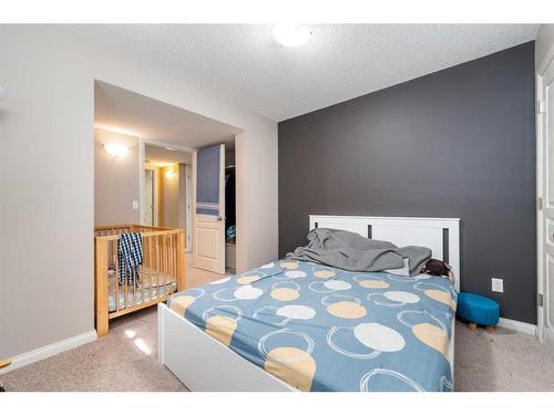 8 Aspen Hills Court Sw, Calgary, AB - Indoor Photo Showing Bedroom