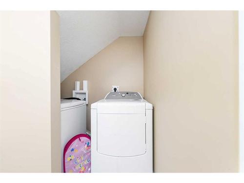 8 Aspen Hills Court Sw, Calgary, AB - Indoor Photo Showing Laundry Room