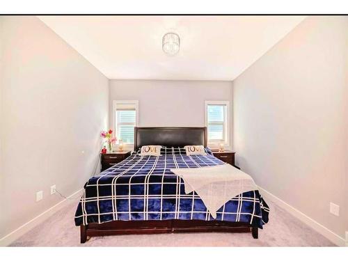 1358 Bayside Drive Sw, Airdrie, AB - Indoor Photo Showing Bedroom