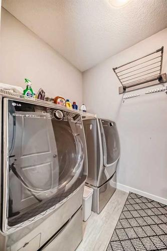 1358 Bayside Drive Sw, Airdrie, AB - Indoor Photo Showing Laundry Room