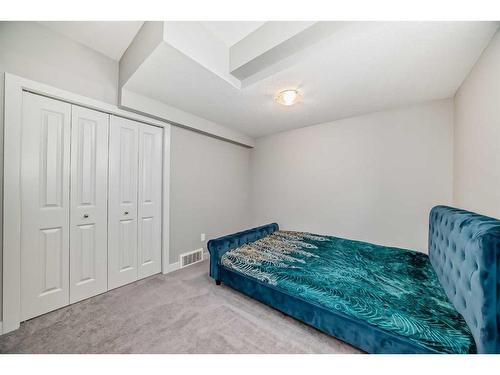 1358 Bayside Drive Sw, Airdrie, AB - Indoor Photo Showing Bedroom