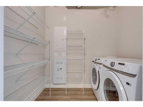 2107-55 Lucas Way Nw, Calgary, AB - Indoor Photo Showing Laundry Room