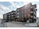 2107-55 Lucas Way Nw, Calgary, AB  - Outdoor With Balcony With Facade 