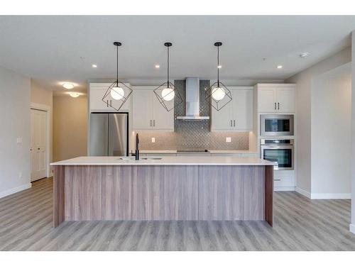 2107-55 Lucas Way Nw, Calgary, AB - Indoor Photo Showing Kitchen With Upgraded Kitchen