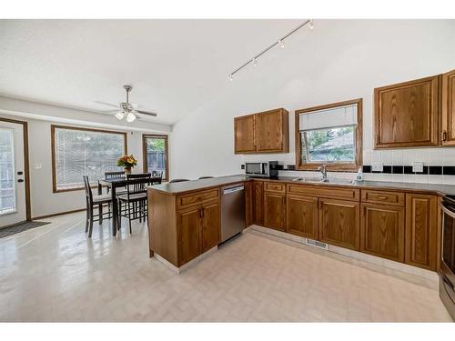 4 Bow Court, Cochrane, AB - Indoor Photo Showing Kitchen With Double Sink