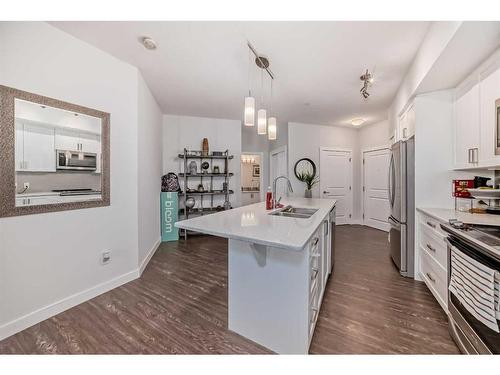 2111-3727 Sage Hill Drive Nw, Calgary, AB - Indoor Photo Showing Kitchen With Double Sink