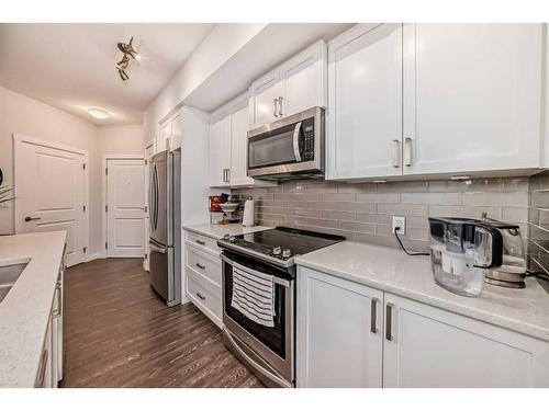 2111-3727 Sage Hill Drive Nw, Calgary, AB - Indoor Photo Showing Kitchen