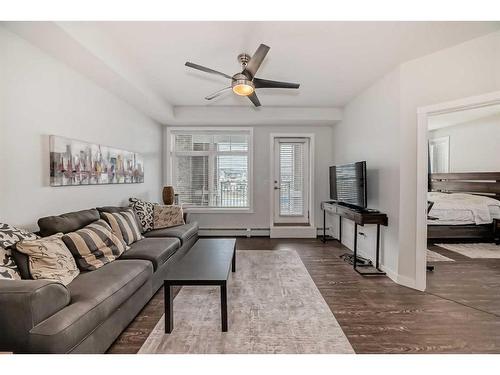 2111-3727 Sage Hill Drive Nw, Calgary, AB - Indoor Photo Showing Living Room