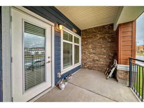 2111-3727 Sage Hill Drive Nw, Calgary, AB - Outdoor With Deck Patio Veranda With Exterior