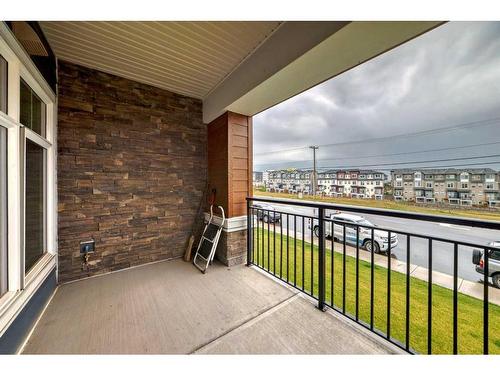 2111-3727 Sage Hill Drive Nw, Calgary, AB - Outdoor With Balcony With Exterior