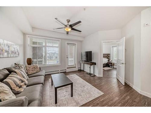 2111-3727 Sage Hill Drive Nw, Calgary, AB - Indoor Photo Showing Living Room