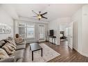 2111-3727 Sage Hill Drive Nw, Calgary, AB  - Indoor Photo Showing Living Room 