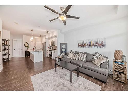 2111-3727 Sage Hill Drive Nw, Calgary, AB - Indoor Photo Showing Living Room