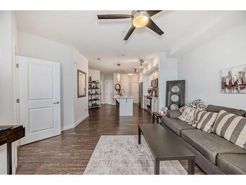 2111-3727 Sage Hill Drive Nw, Calgary, AB - Indoor Photo Showing Living Room