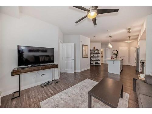 2111-3727 Sage Hill Drive Nw, Calgary, AB - Indoor Photo Showing Living Room