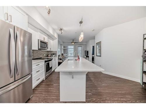 2111-3727 Sage Hill Drive Nw, Calgary, AB - Indoor Photo Showing Kitchen With Upgraded Kitchen