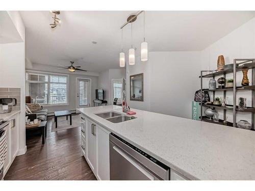 2111-3727 Sage Hill Drive Nw, Calgary, AB - Indoor Photo Showing Kitchen With Double Sink With Upgraded Kitchen