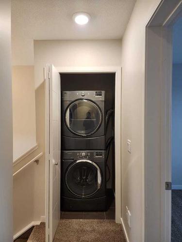 66 Nolan Hill Heights Nw, Calgary, AB - Indoor Photo Showing Laundry Room