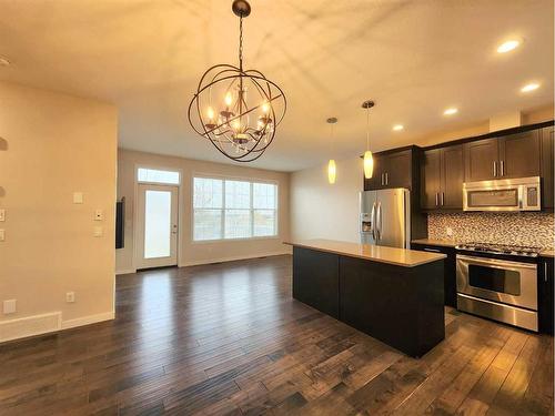 66 Nolan Hill Heights Nw, Calgary, AB - Indoor Photo Showing Kitchen With Stainless Steel Kitchen