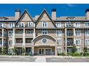 408-20 Mahogany Mews Se, Calgary, AB  - Outdoor With Balcony With Facade 