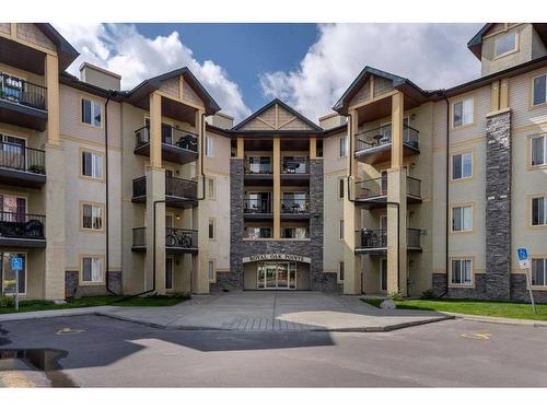 1232-8810 Royal Birch Boulevard Nw, Calgary, AB - Outdoor With Balcony With Facade