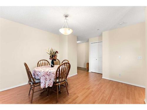 1232-8810 Royal Birch Boulevard Nw, Calgary, AB - Indoor Photo Showing Dining Room