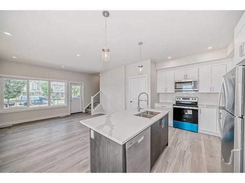 84-351 Monteith Drive Se, High River, AB - Indoor Photo Showing Kitchen With Double Sink With Upgraded Kitchen