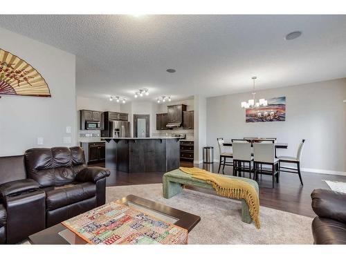 1338 Kings Heights Way Se, Airdrie, AB - Indoor Photo Showing Living Room