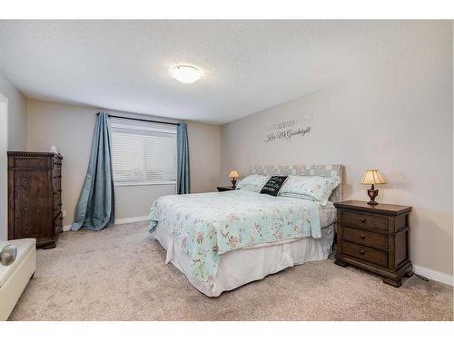 1338 Kings Heights Way Se, Airdrie, AB - Indoor Photo Showing Bedroom