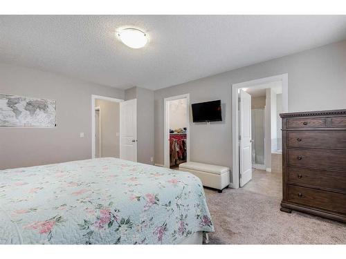 1338 Kings Heights Way Se, Airdrie, AB - Indoor Photo Showing Bedroom